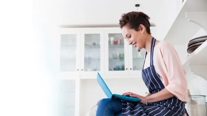 Small business employee using laptop