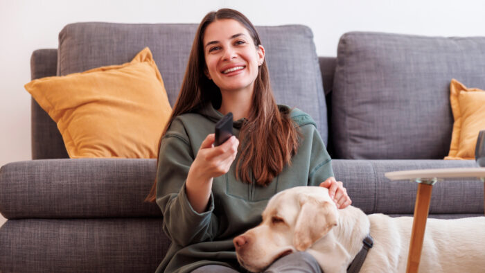 lady-with-dog-watching-tv